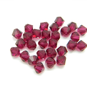 24 Pcs SWAROVSKI 5mm 5301 Bicone Crystal Bead