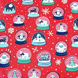 May include: Red fabric with a repeating pattern of snow globes. Each snow globe has a different winter scene inside, including a snowman, a penguin, a reindeer, a polar bear, a house, a tree, and a car.