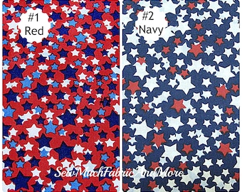 May include: Two fabric swatches with a white, red, and blue star pattern. The first swatch is red with blue and white stars. The second swatch is navy blue with red and white stars. The swatches are labeled #1 Red and #2 Navy.