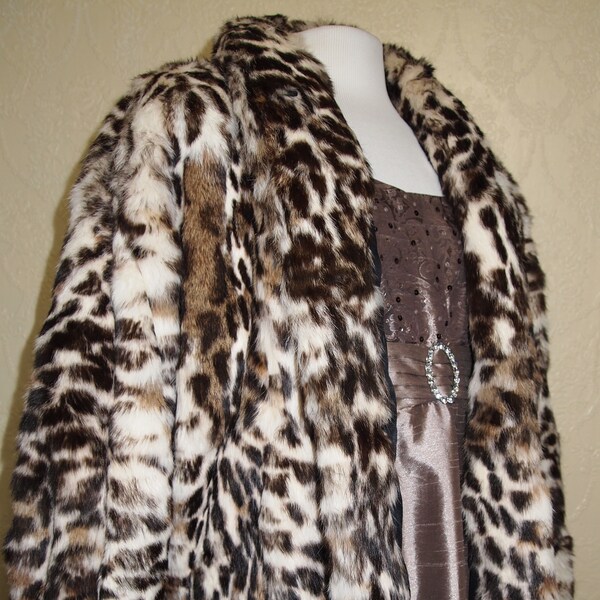 m18 sale 85.00 off...like new Gorgeous SNOW LEOPARD PRINT Fur Coat size 12-18 batwing sleeve fur coat