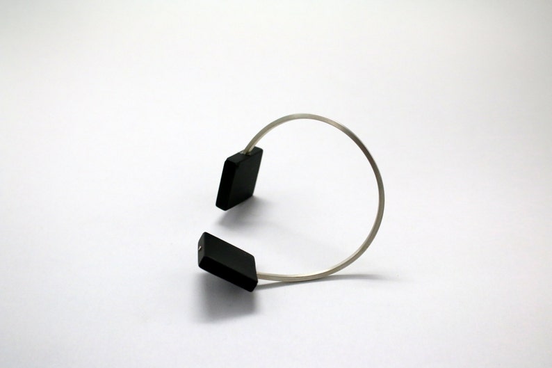 silver line bracelet with square black agates