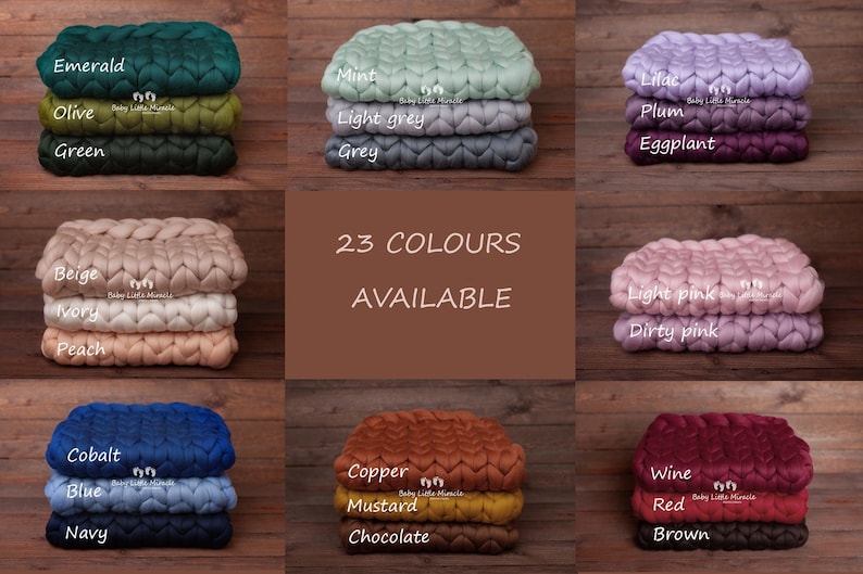 May include: A collection of 23 colors of chunky knit baby blankets. The blankets are arranged in rows of three, with each row featuring a different color palette. The colors include emerald, olive, green, beige, ivory, peach, mint, lilac, plum, light grey, grey, eggplant, cobalt, blue, navy, copper, mustard, chocolate, light pink, dirty pink, wine, red, and brown.