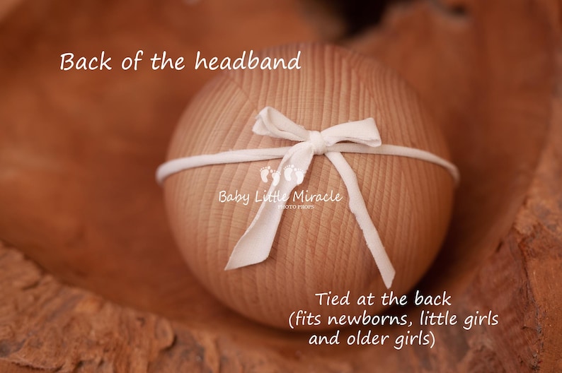 May include: White headband with a bow tied at the back. The headband is made of a soft, stretchy material and is designed to fit newborns, little girls, and older girls. The text "Baby Little Miracle" is printed on the headband.