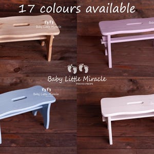 May include: Four small wooden step stools in different colors: natural, lavender, light blue, and white. Each stool has a rectangular top with a handle-shaped cutout and four legs. The text "17 colours available" is at the top.