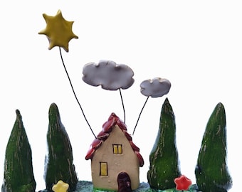 Escultura de cerámica hecha a mano: una decoración caprichosa para el hogar