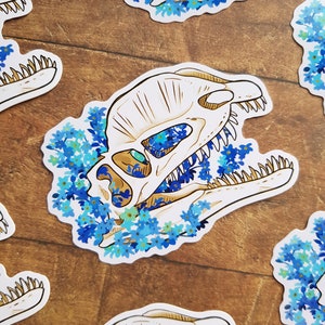 Forget me Not - Vinyl Die Cut Sticker, Dilophosaurus Skull, Blue Flowers, Dinosaurs, Dilo