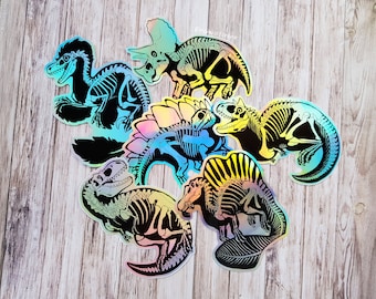 Skeleton Dino Bundle - 6 Holographic Vinyl Die Cut Stickers, Raptor, Stego, Rex, Carno, Spino, Triceratops