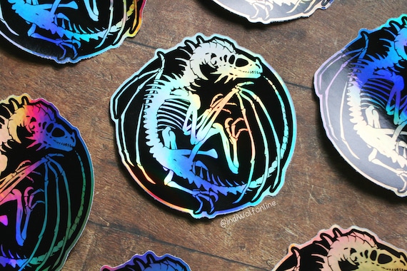 Ancient Bones - Vinyl Holographic Sticker | 8x8cm | Holographic, Dragon, Bones, Fantasy Sticker