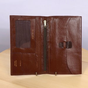 Real leather wallet / case || Made in England || Buttons and zipper || Brown leather || Cumberland calf British made