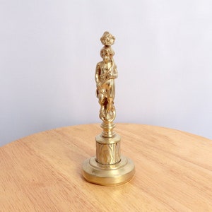 Sculpture / statue / figurine of a man holding fruits his head || Antique solid brass