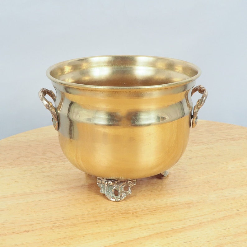 Flower pot / Bucket Vintage solid brass item with handles and elevated on three legs image 1