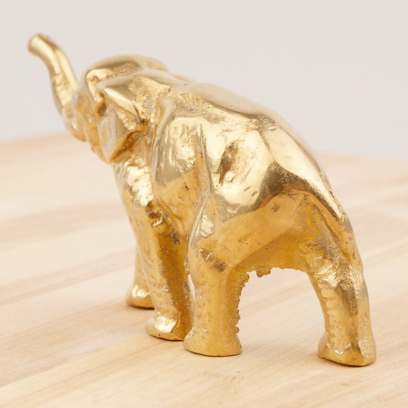 Elephant with its nose pointing up in the air Vintage