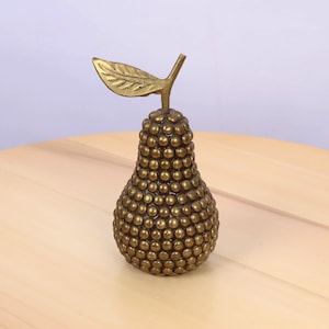 Pear figurine / Vintage brass || The item looks like it is made of many small brass balls