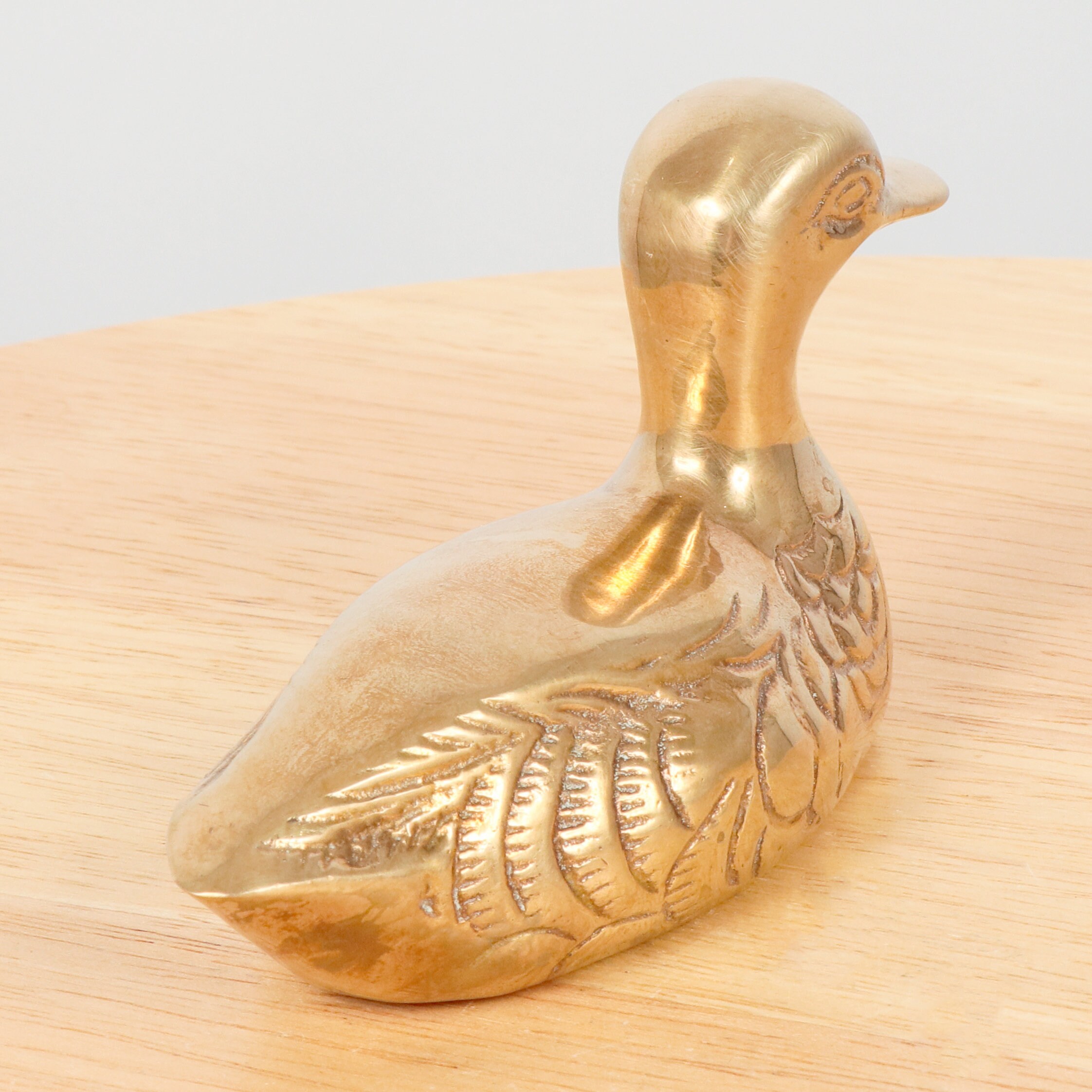solid brass duck figurines