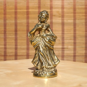 Vintage heavy solid brass sculpture of a Victorian lady in a dress || heavy statue