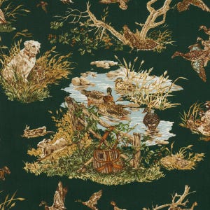 May include: Dark green fabric with a hunting scene. Depicted are ducks, a dog, rabbits, and a fishing basket near a stream. The artwork has a vintage, rustic aesthetic with natural tones of brown, beige, and green.