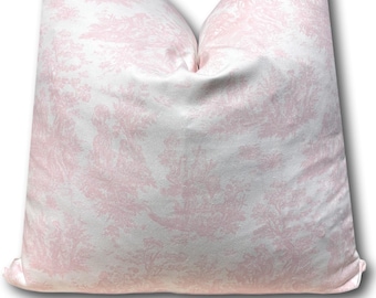 May include: A pink and white patterned throw pillow with a subtle floral design.