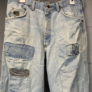 Vintage 1960s Faded Wrangler Jeans Patched Distressed Short Length High Waisted Vintage Denim 34 Inch Waist Well Worn Thrashed Size 10 Md B1