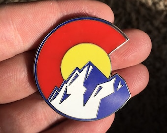 Pin de plata de las montañas de Colorado
