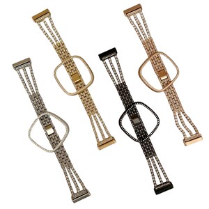 May include: Four different colored watch bands with a square design. The bands are made of metal and have a row of rhinestones on each side. The bands are gold, silver, black, and rose gold.