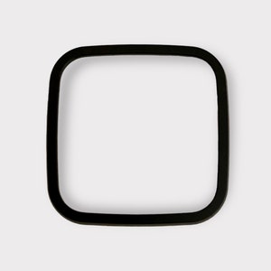 May include: A black square-shaped frame with rounded corners.