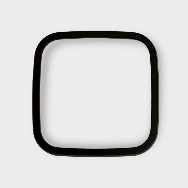 May include: A black square-shaped frame with rounded corners.