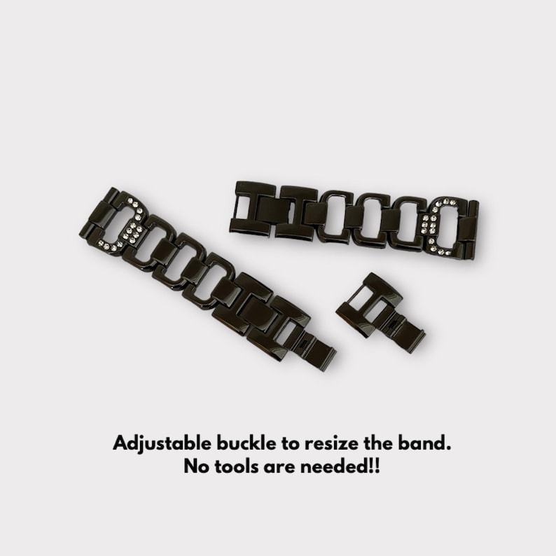 May include: Black watch band with a crystal-embellished buckle. The band is made of metal links and has an adjustable buckle.  "Adjustable buckle to resize the band. No tools are needed!"