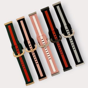 May include: Set of six watch bands with different color combinations. Each band has a contrasting stripe and a buckle closure.