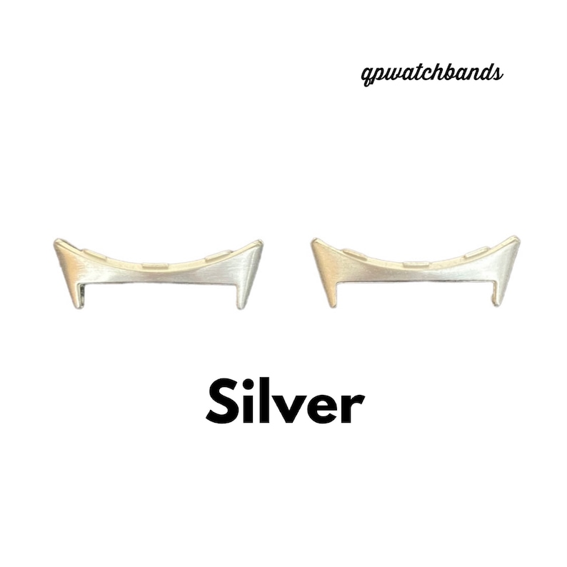May include: Two silver watch strap spring bars. The spring bars are curved and have a polished finish. gpwatchbands.