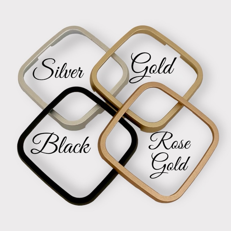 May include: Four square-shaped watch bands in different colors: silver, gold, black, and rose gold.