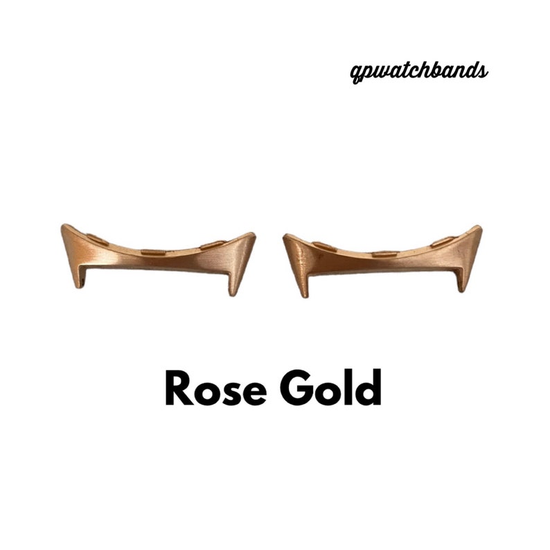 May include: Two rose gold watch band spring bars. The spring bars are curved and have a polished finish. gpwatchbands.