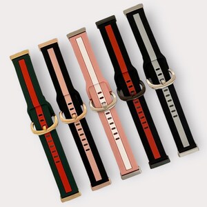May include: Set of six watch bands with different color combinations. Each band has a contrasting stripe and a buckle closure.