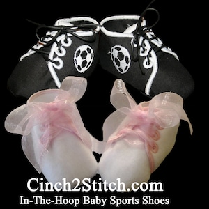 May include: A pair of white baby shoes with pink bows and a pair of black baby shoes with white laces and a soccer ball design. The shoes are embroidered with the text "Cinch2Stitch.com In-The-Hoop Baby Sports Shoes".