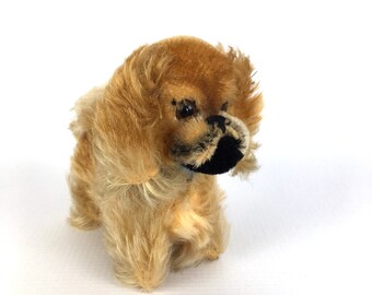 steiff dog on wheels