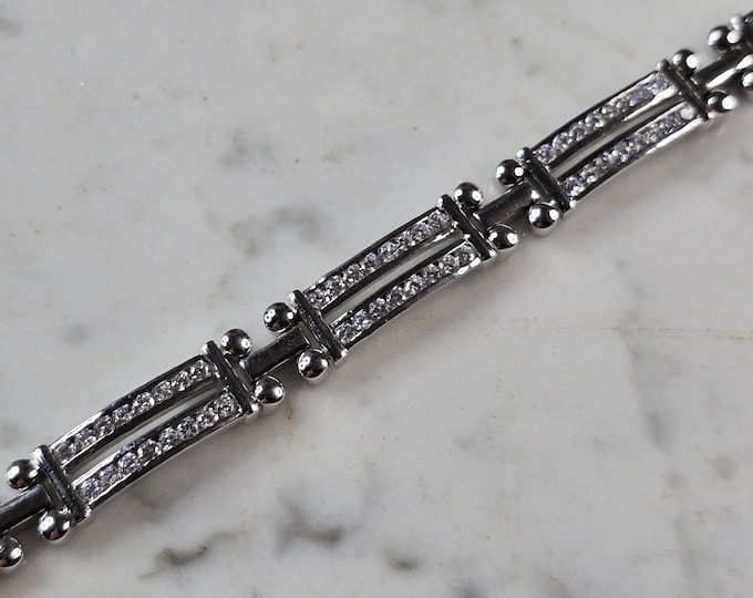 Womens Sterling Silver CZ Modernist Tennis Bracelet 32.9g E6671