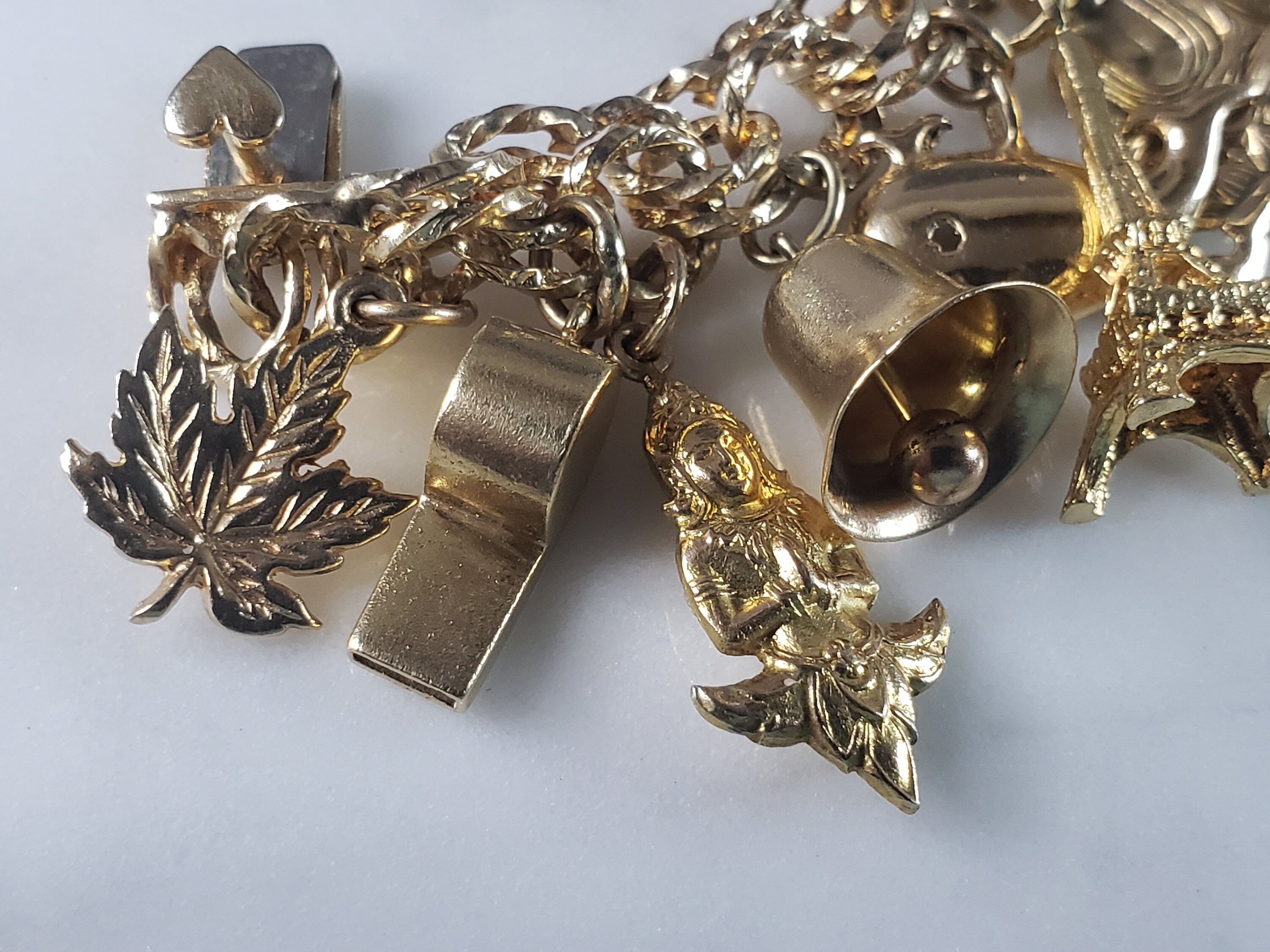 Gold Filled Charm Bracelet with Gold and Gold-Filled Charms (Lot 1048 -  Estate Jewelry, Fashion & Sterling SilverJun 16, 2022, 10:00am)