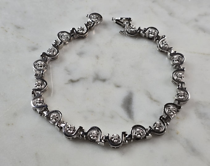 Womens Sterling Silver CZ Modernist Tennis Bracelet 21.5g E6665