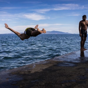 Short Flight: Pakistani refugees go swimming. Lesvos, Greece 2016 image 2