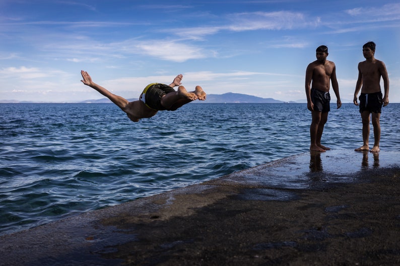 Short Flight: Pakistani refugees go swimming. Lesvos, Greece 2016 image 2
