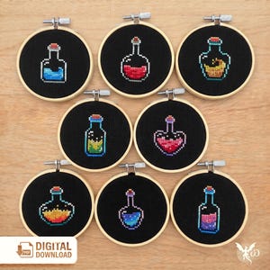 May include: A collection of eight cross-stitch embroidery hoops. Each hoop features a black background with a colorful potion bottle design. The bottles are filled with various colors, including blue, red, yellow, and pink. The text "DIGITAL DOWNLOAD" is visible.