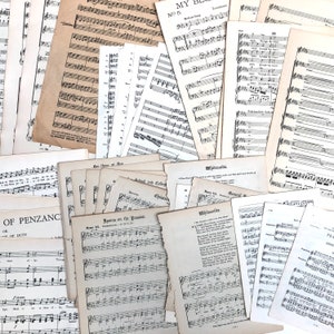 Mixed music sheet pages pack tidied with ribbon, 40 pieces. image 1