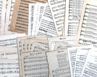 Mixed music sheet pages pack tidied with ribbon, 40 pieces.