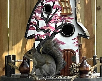 Squirrel feeder house Garden decor. Sakura Japanese style. House garden decor post.