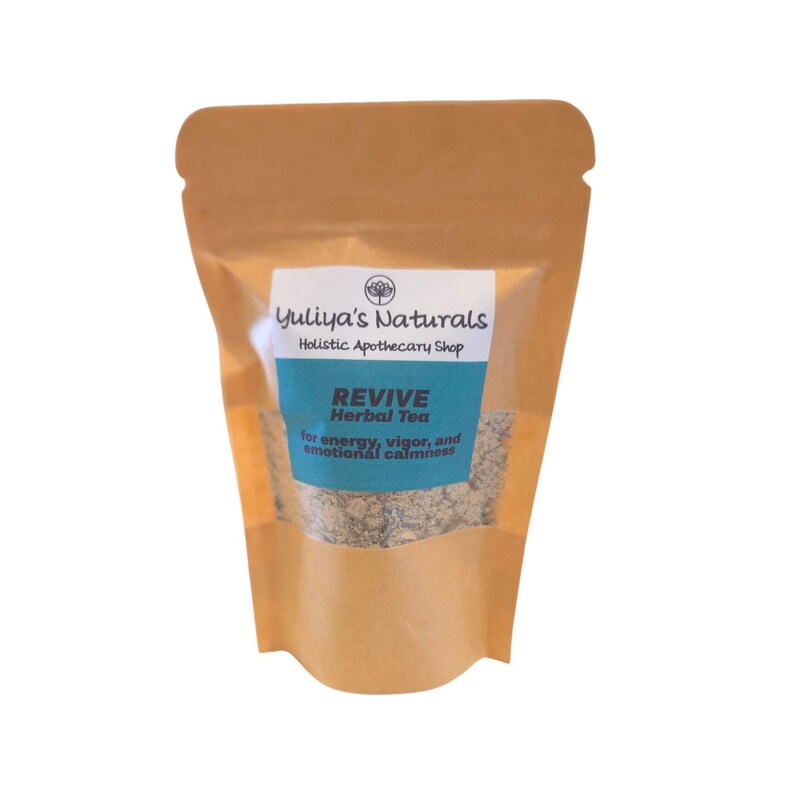 May include: A brown paper pouch with a label that reads "Yuliya's Naturals Holistic Apothecary Shop" and "REVIVE Herbal Tea for energy, vigor, and emotional calmness".
