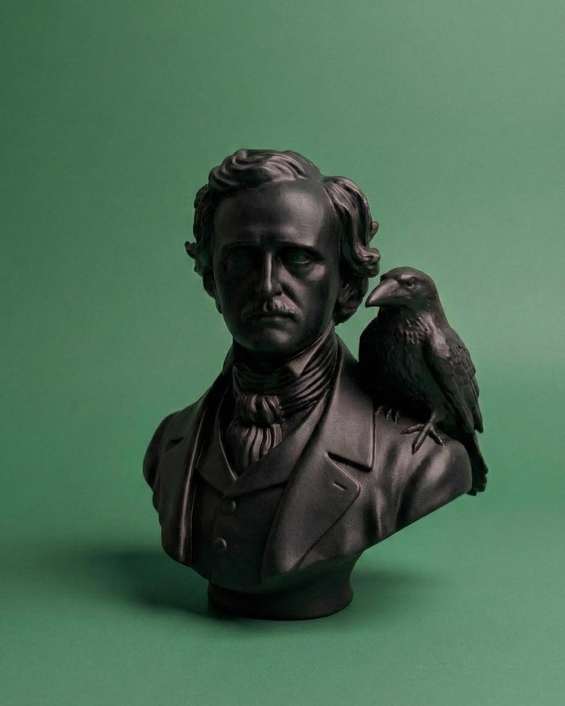 May include: A black bust of Edgar Allan Poe with a raven perched on his shoulder. The bust features detailed facial features, a coat, and a cravat. The raven is also black and has detailed feathers. The background is a solid green.