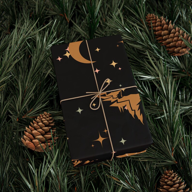 Black Gold ACOTAR Themed Wrapping Paper Night Court Collection Rhysand Wing Pattern Details Star Mountain Artwork Beautiful Gift Wrap Elegant Present Packaging Special Occasion Paper Multiple Size Options Quality Construction