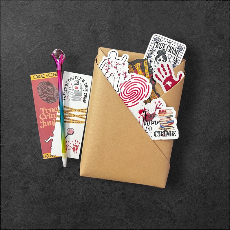 May include: A brown paper envelope filled with true crime themed stickers. The stickers feature various designs, including a bloody handprint, a fingerprint, a person with blood splatters, and the text "Fueled by Coffee & True Crime".