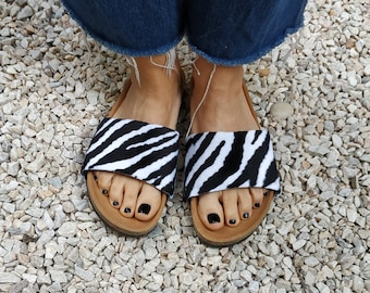 Happy Zebra covers for the 'Ethical Magic Sliders' made of recycled vegan material.