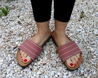 Striped dusty rose print covers for the 'Ethical Magic Sliders', made of cork fabric & various textiles.