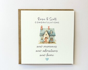May include: A congratulatory card with a watercolor illustration of a blue house with a red door. The card says "Rosie & Scott Congratulations" and "new memories new adventures new home" with a blue heart.